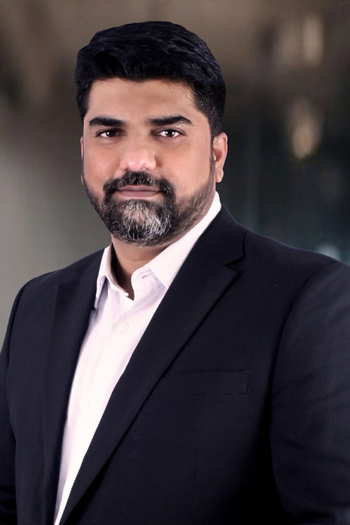 Portrait of Aniket Kodre, VP of Customer Success at Next Quarter