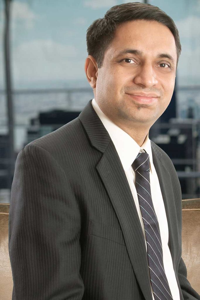 Portrait of Puneet Gaur, Chief Operating Officer of Next Quarter